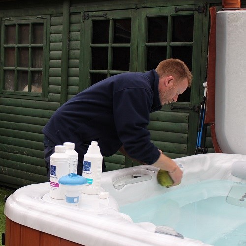 Man Cleaning Hot Tub